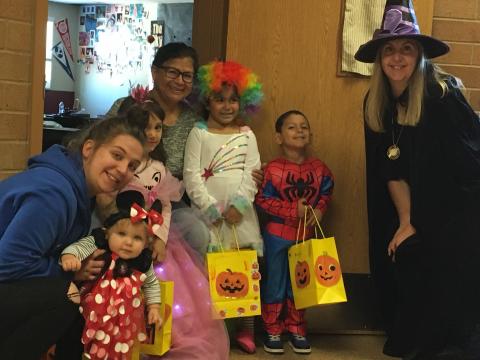kids and adults in costumes