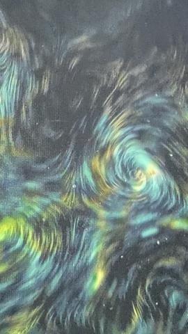 Close up of swirling blue and green brushstrokes