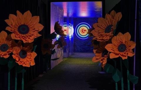 Three foot paper sunflowers flanking doorway