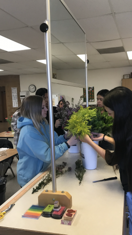 students choosing filler flowers