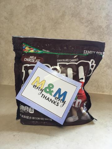 m&m bag with tag saying "Many & Many Thanks"