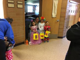 kids with trick-or-treat bags