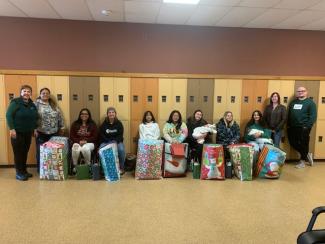 students with gift bags